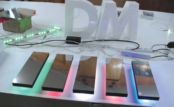 Mirror finish composite laminated letters with plug together LEDs shown in several colours. Mirror finish composite laminated letters with plug together LEDs shown in several colours.