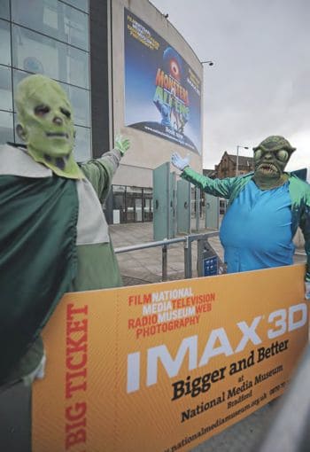 Outside the Cinema infront of the sign