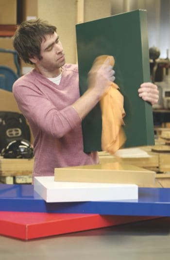 Daniel Oliver, Operations Manager of SignTrade Letters, polishing off some of the first ReadySign products.