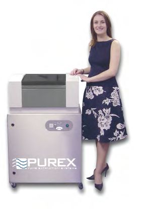 The Xbase extraction and filtration system with a laser engraving machine attached on top.