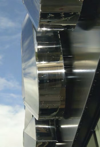 Looking up from ground level at the sign.