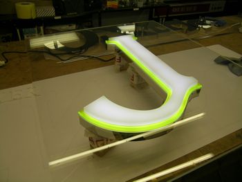 Built up stainless steel letter in workshop