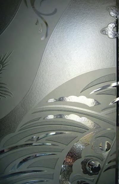 An example of French Embossing, the corroding of glass with an acid to produce a great variety of tones, textures and decorations.