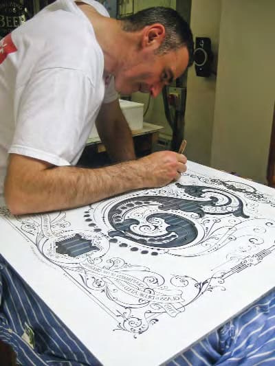 Gary Millie working on a glass panel at one of David’s workshops.