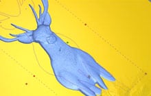 A wooden 3D sign saying 'The village Inn'