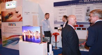 People talking to each other at show stand