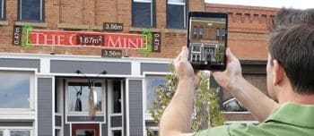 person using measuring tool