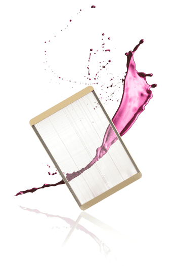 piece of glass with pink splash going through