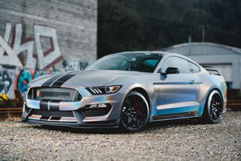 Car covered in gloss vinyl wrap
