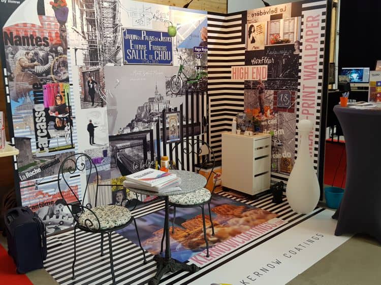 An exhibition stand showing many examples of the satin matt finish of the WallSharK material and the seamless joints between the different panels, like a traditional wallcovering.