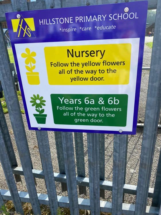 Social distancing signage for a school