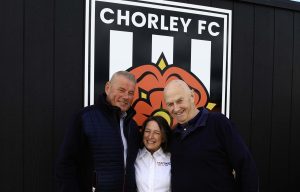 FASTSIGNS Manchester ChorleyFC L R JeffClarke Chorley CommercialDirector JulieMorris FS BDM TerryRobinson ChorleyChiefExec 3 1 scaled e1741260250168 FASTSIGNS Manchester gives support to Chorley FC through new sponsorship