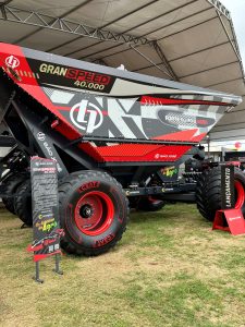 Grain loader Corimpress creates F1-inspired graphics on gigantic grain loader