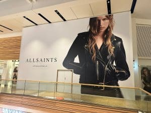 A SAINTS Dragon Signs creates striking graphics for multiple AllSaints stores