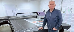John Nolan, production director at Prestige Signs with the Mimaki JFX500-2131 grand-format flatbed UV printer
