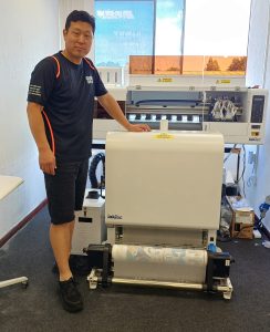 Simon at Galaxy with DTF Printer Production capacity increased for Galaxy Value Solutions with new DTF printer