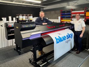 Blue Sky Signs Dave Oldfield L and Soyang Europes Mitch Anstey R with the new Mimaki printer scaled e1782901968226 Blue Sky Signs improves production with Mimaki installation