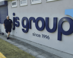Rob in front of the Jonsigns workshop Celebrating a milestone: 48 years in the sign industry