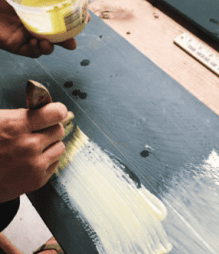 Create a crackle finish background using wood glue